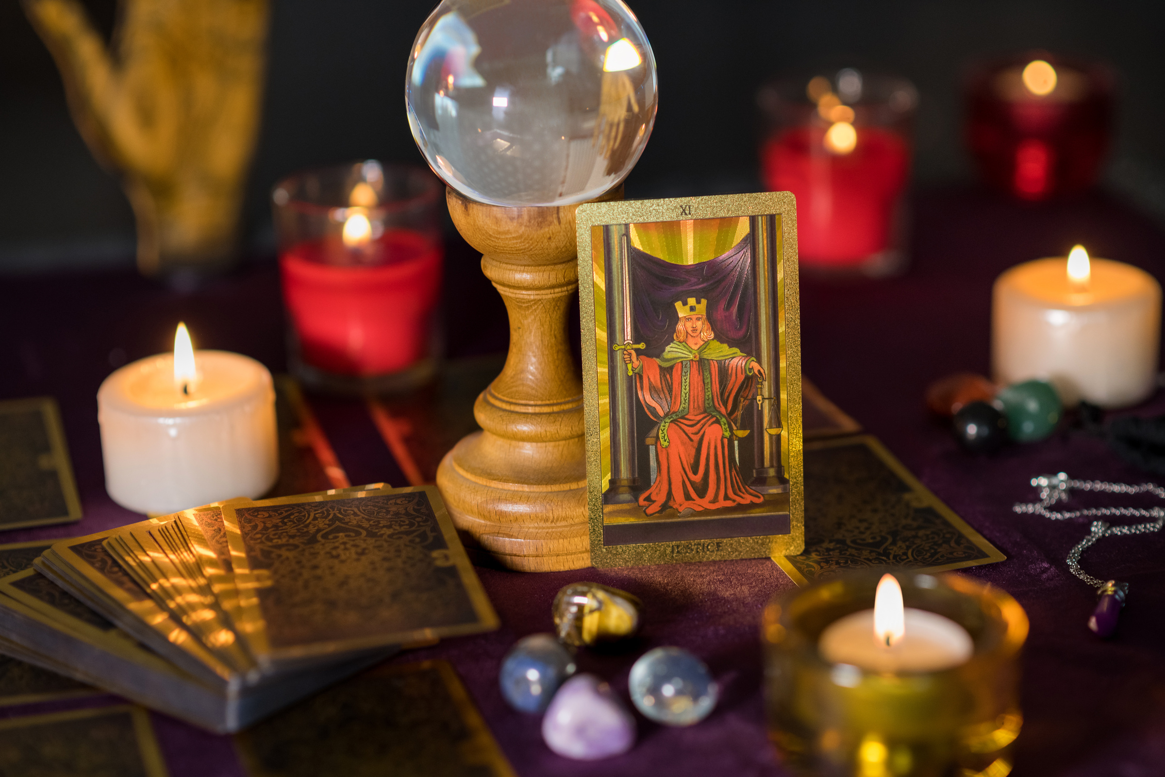 Justice tarot card on table